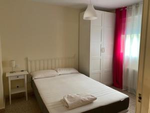 Postel nebo postele na pokoji v ubytování San Juan Beach Flat