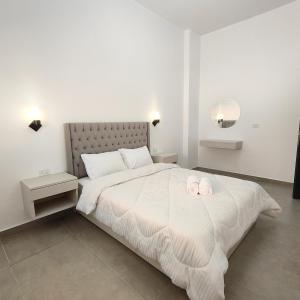 Ένα ή περισσότερα κρεβάτια σε δωμάτιο στο Ocean Apartment