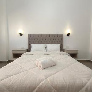 Ένα ή περισσότερα κρεβάτια σε δωμάτιο στο Ocean Apartment +8 φωτογραφίες