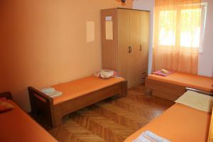 Postel nebo postele na pokoji v ubytování Eros Rooms