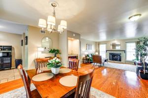 a dining room and living room with a table and chairs at Balcony, Walk to Hospital Condo in San Antonio in San Antonio