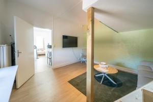 TV a/nebo společenská místnost v ubytování Le Andy - Cosy 2 lits - 4 pers' - Wifi - Gare
