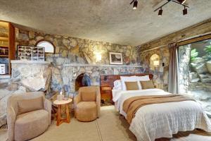 Ένα ή περισσότερα κρεβάτια σε δωμάτιο στο Casa Grotto