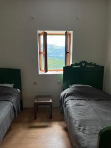 Postel nebo postele na pokoji v ubytování Kota 1120