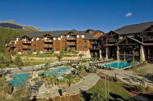 an aerial view of a resort with a swimming pool at Grand Timber Lodge in Breckenridge
