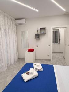 Postel nebo postele na pokoji v ubytování Max Fox Suite
