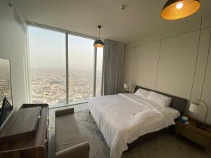 En eller flere senge i et værelse på Rafal Tower by JW Marriott برج رافال + 12 billeder