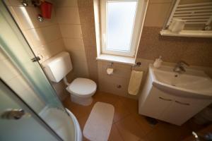 Kúpeľňa v ubytovaní Apartments Pina
