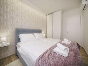 Voodi või voodid majutusasutuse Two Bedroom Villa with Terrace and Swimping pool toas +30 fotot