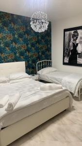 A bed or beds in a room at Casa Ammare