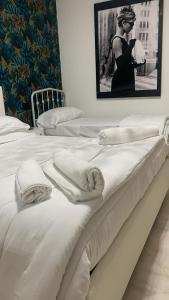 A bed or beds in a room at Casa Ammare