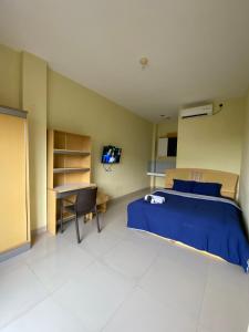 Postel nebo postele na pokoji v ubytování Homestay Sentul Bogor