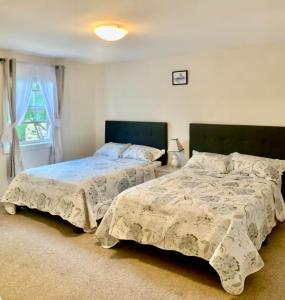 Ένα ή περισσότερα κρεβάτια σε δωμάτιο στο THT's house-Ideal Downtown Area