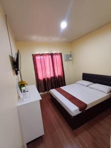 Fotografie z fotogalerie ubytování Twin Palm Guesthouse v destinaci Panabo + 3 fotografie