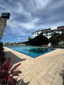 a large swimming pool in front of a building at Casa En El Sur in Santa Rosa +11 photos