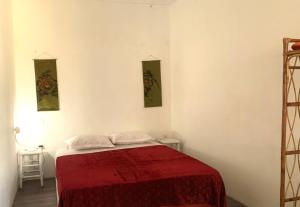 Postel nebo postele na pokoji v ubytování DeK in Kampot