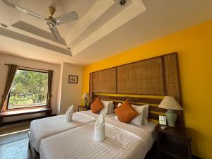 Postel nebo postele na pokoji v ubytování Baan Krating Pai Resort - SHA Plus + 37 fotografií