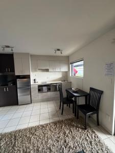 Kuchyň nebo kuchyňský kout v ubytování Seaspray Suites Unit 5 & 11