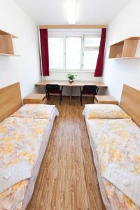 Cama o camas de una habitación en Hostel Sinkule