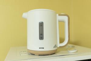 a white mixer sitting on top of a counter at Mary's Maison Repos in Fukuoka
