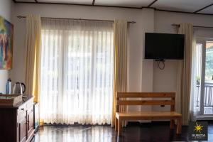 TV/trung tâm giải trí tại Suriya Guest