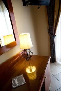 TV a/nebo společenská místnost v ubytování Hotel Barbieri