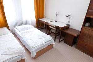 Postel nebo postele na pokoji v ubytování Hostel Hlávkova