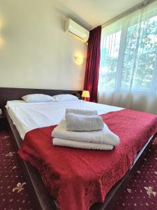 Postel nebo postele na pokoji v ubytování Hotel Marie + 36 fotografií
