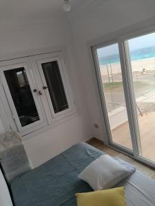 Ένα ή περισσότερα κρεβάτια σε δωμάτιο στο Sea sky sleep & repeat +10 φωτογραφίες