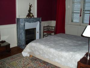 Postel nebo postele na pokoji v ubytování Chateau des poteries