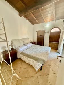 Posteľ alebo postele v izbe v ubytovaní Casa vacanze Elena