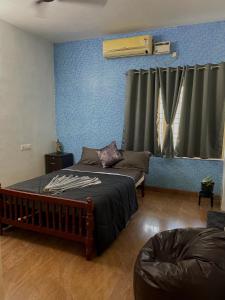 Postel nebo postele na pokoji v ubytování SJ Properties