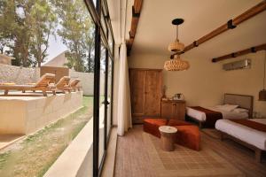 Voodi või voodid majutusasutuse Sphinx House toas
