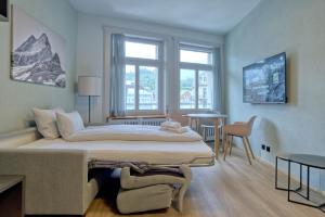 Postel nebo postele na pokoji v ubytování BANK House Apartment L 305 - GRIWA RENT