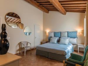 Postel nebo postele na pokoji v ubytování Resort Casale Le Torri
