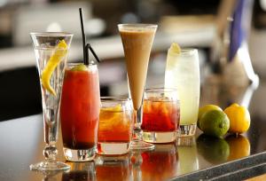 a group of four different types of drinks on a table at Park Central Hotel in Bournemouth
