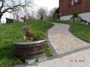 Zahrada ubytování Le Chalet au vieux vignoble avec espace Sauna et Jacuzzi
