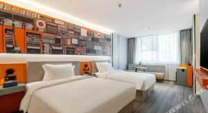 Katil atau katil-katil dalam bilik di 7 Days Inn Baoding Railway Station