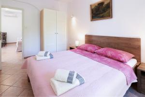 Postel nebo postele na pokoji v ubytování Apartmani Svoboda