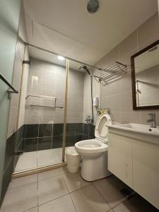 Kúpeľňa v ubytovaní Xingyi Hotel