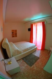 Postel nebo postele na pokoji v ubytování Gualtiero Camere & Suite