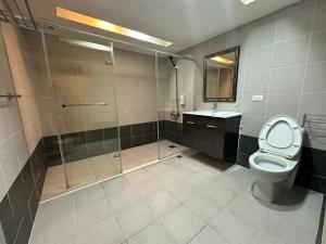 Kúpeľňa v ubytovaní Xingyi Hotel