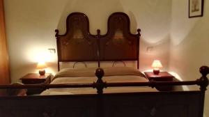 מיטה או מיטות בחדר ב-B&B Villa Acero
