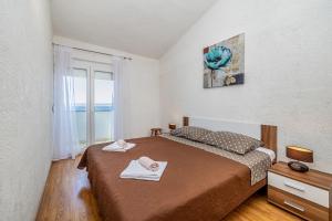 Katil atau katil-katil dalam bilik di Private accommodation STARA BASKA