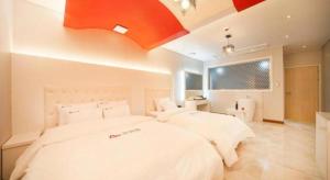Katil atau katil-katil dalam bilik di SH Hotel