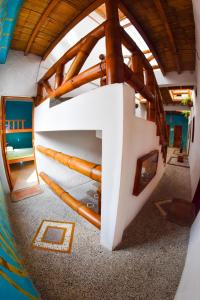Postel nebo postele na pokoji v ubytování Hotel Karukera