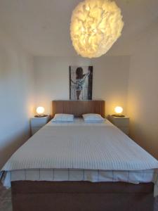 Postel nebo postele na pokoji v ubytování Apartments Mato