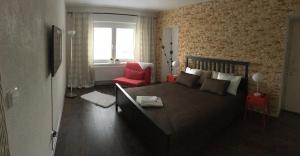 Postel nebo postele na pokoji v ubytování Apartments Centrum