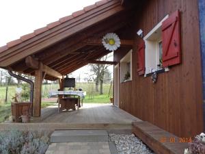 Zahrada ubytování Le Chalet au vieux vignoble avec espace Sauna et Jacuzzi