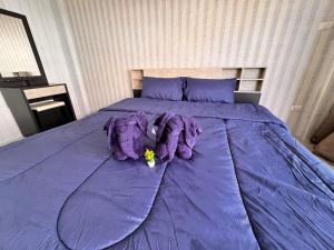 Postel nebo postele na pokoji v ubytování Tropikathu Guest House